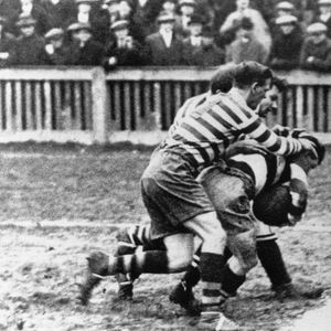 Three Oldham defenders put a Widnes man in touch - Feb 21st 1925.