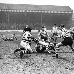 Kemel passes to Dawson in Ayres tackle - March 25th 1958.