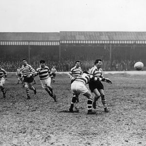 Dennis Ayres gets a pass away in Dawson's tackle v Widnes - March 25th 1958.