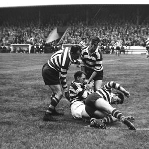 Charlie Winslade, Des McKeown and Geoff Robinson combine to bring down a Widnes player - Sep 19th 1959.