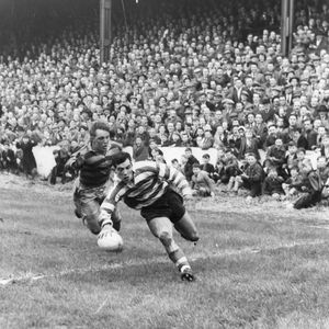 Alan Davies avoids Norman Cherrington to score at Watersheddings - March 30th 1957.