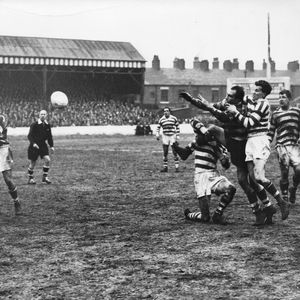 Charlie Winslade passes toDick Cracknell in Mick Sullivan's tackle - April 5th 1958.