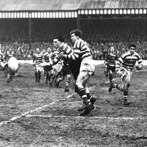 Dick Cracknell passes to Vince Nestor in Mick Sullivan's tackle - April 5th 1958.