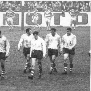 The Oldham players walk back after John Donovan's try - Nov 21st 1964.
