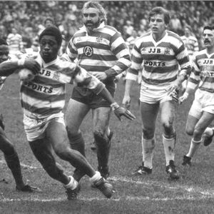 Henderson Gill tries to get away from Pat Mitchell and Alan McCurrie - April 8th 1985
