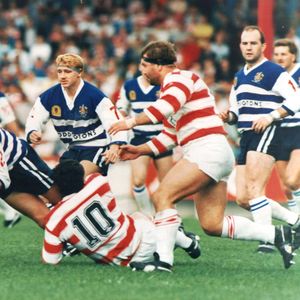 Colin Hawkyard falls to a tackle from Brian Case - Aug 28th 1988.