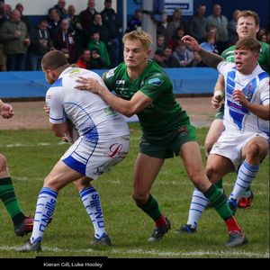 Luke Hooley tackles a Workington player watched by Keiran Gill and Paul Crook - April 29th 2018.