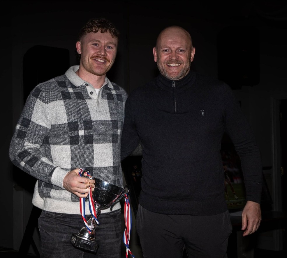 Brian Walker Award - Coach Alan Kilshaw presents the award to Tom Nisbet